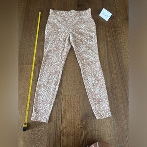 Very stretchy pants. Looks almost like a leopard print.